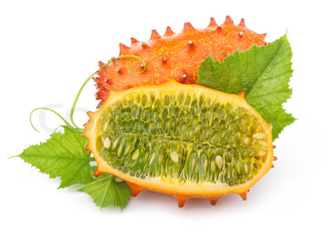 Ripe sliced kiwano fruits isolated on white melón africano espinudo
