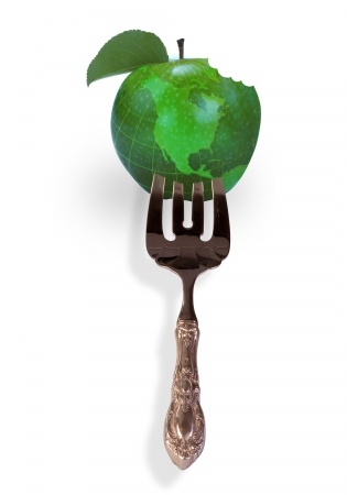 tenedor pinchando el mundo